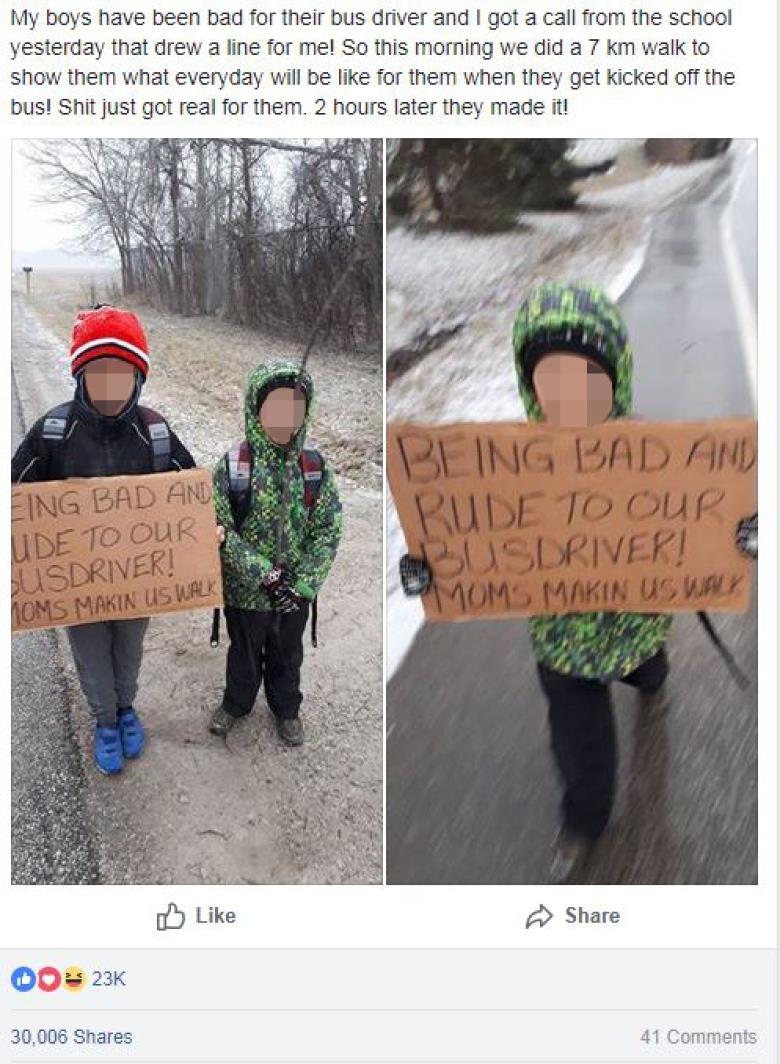 a close up of a sign: The mother posted photos of the boys walking on Facebook Tuesday. The post has since gone viral with 30,000 shares and more than 24,000 reactions. Dozen commented in support of the mother's actions.